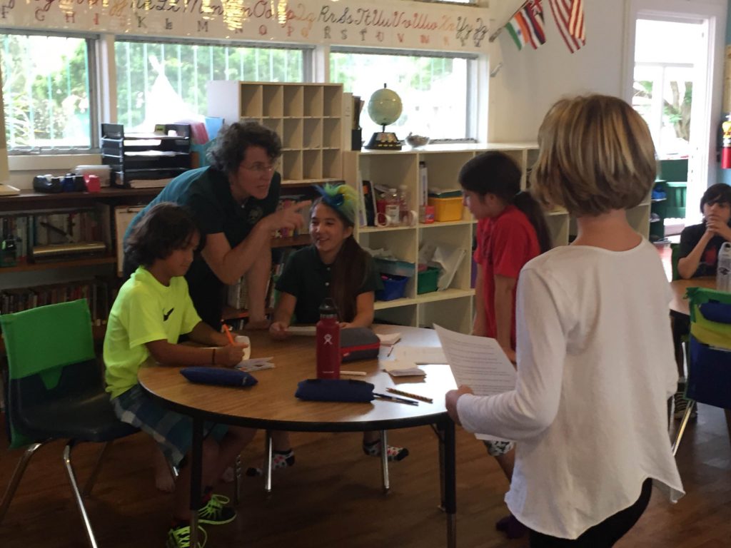 Waimea Country School students, along with teacher Laurel Matsuda, prepare for a video they created based on their conflict resolution training.